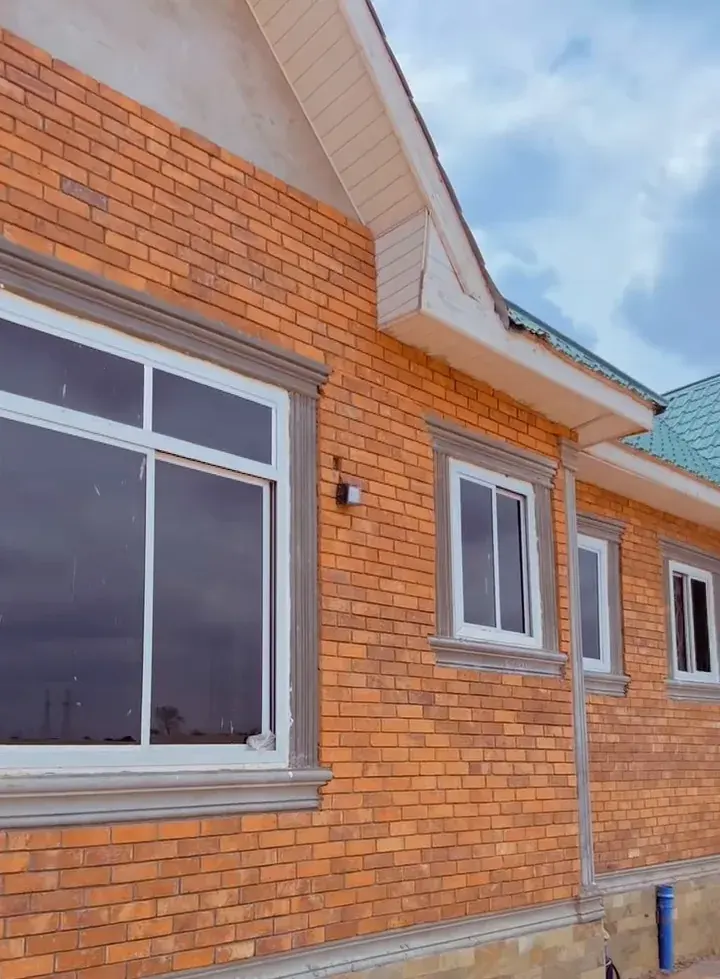 Clay brick cladding on a house exterior, Dodoma
