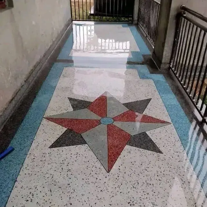 Terrazzo balcony floor with a red and grey star