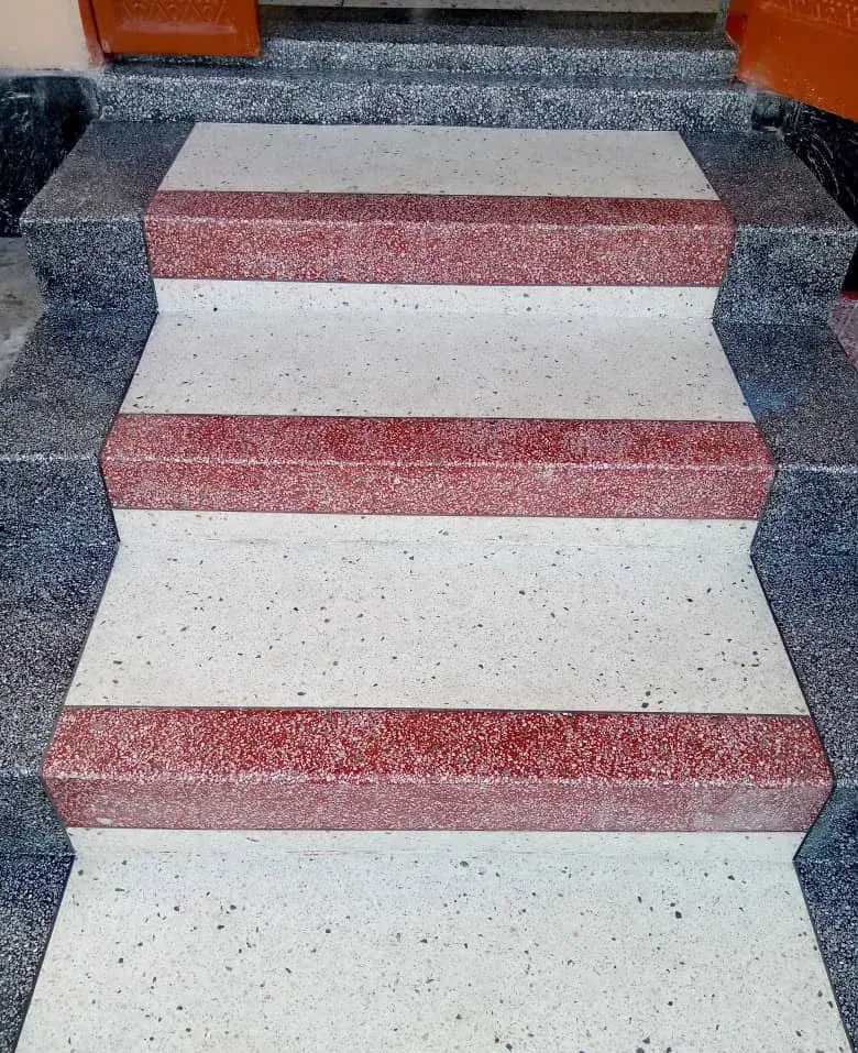 Terrazzo stairs with red step edges
